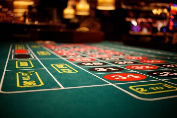Live dealer casino setup with multiple tables and professional dealers